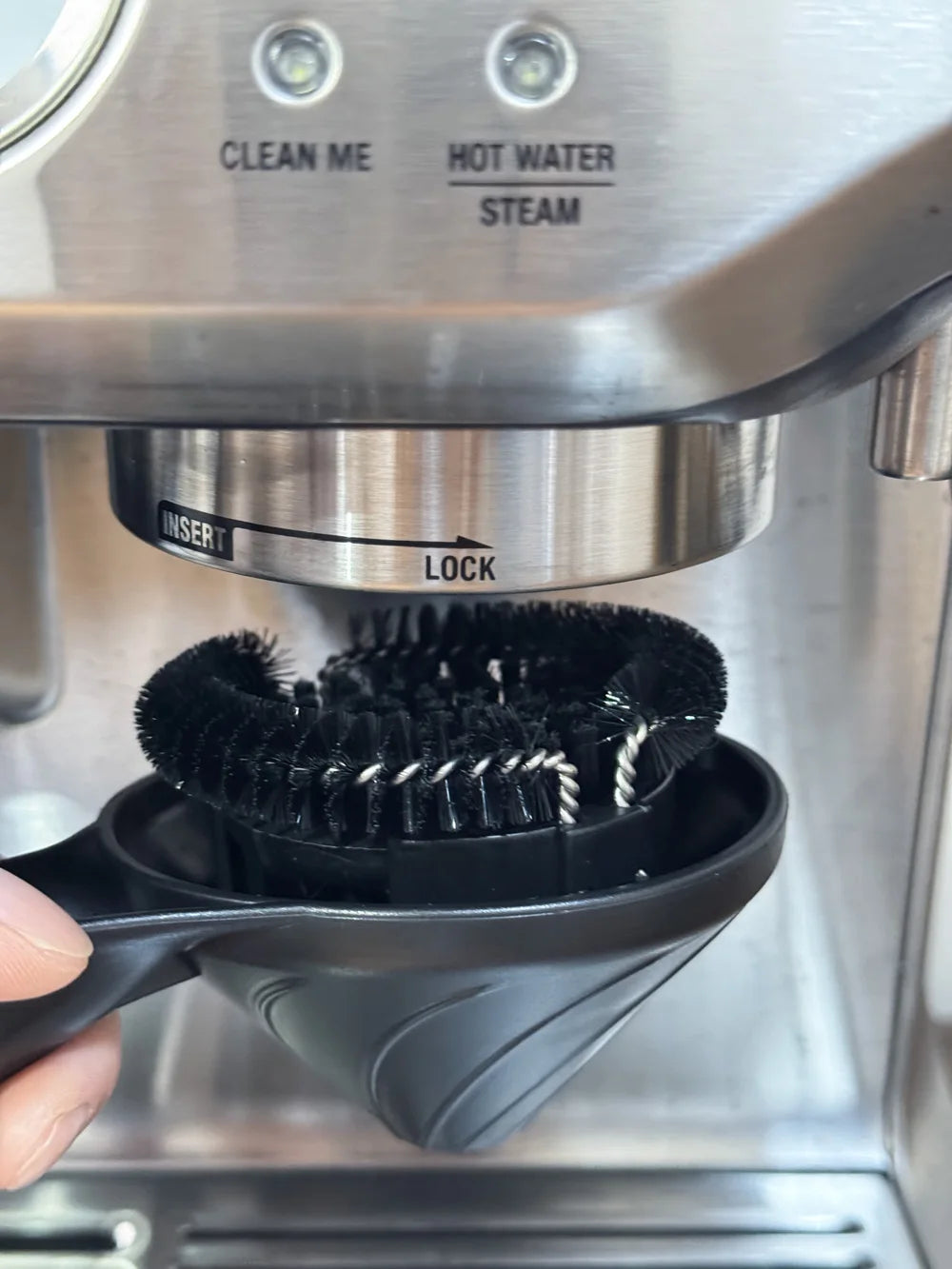 58mm espresso brush laid flat showing full length and plastic body construction