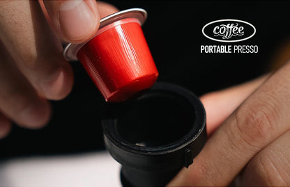 Dejess hand press espresso maker fitting inside open backpack showing compact travel-ready size