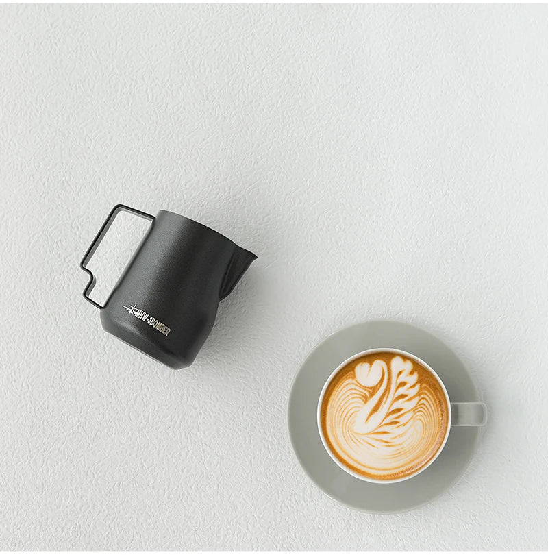 MHW-3BOMBER Turbo Frothing Pitcher flat lay with espresso accessories coffee tools