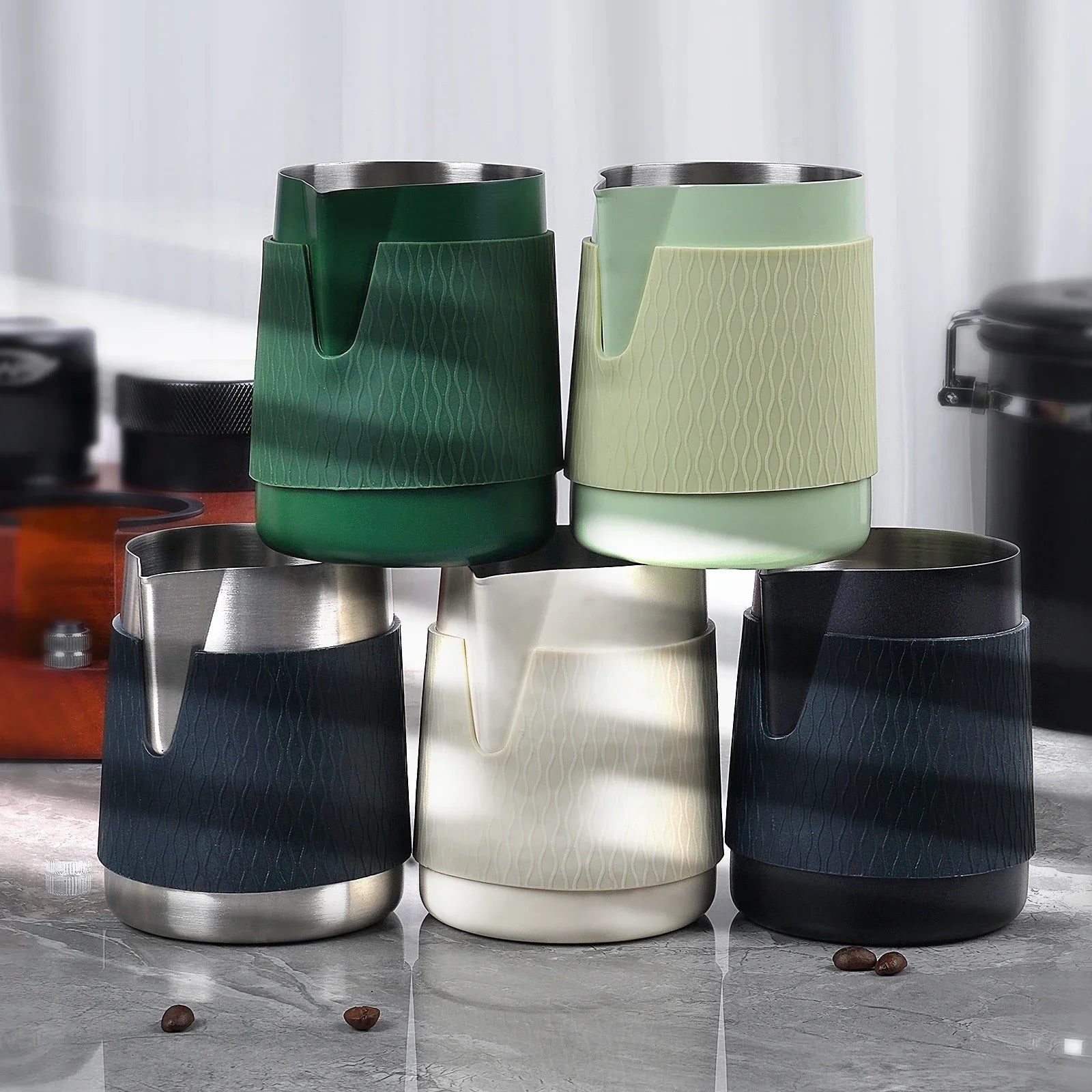 Sharp spout espresso steaming pitcher pouring microfoam latte art into coffee cup