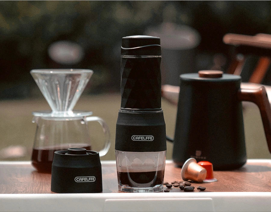 Side profile of compact travel coffee machine showing slim lightweight design and dimensions