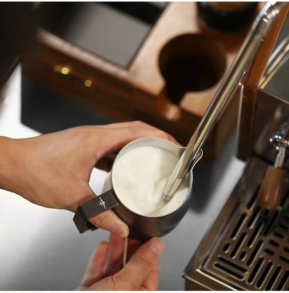 MHW-3BOMBER milk pitcher ergonomic wide handle comfortable grip close-up