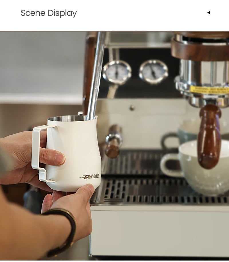 MHW-3BOMBER 450ml steam pitcher filled with microfoam ready to pour latte