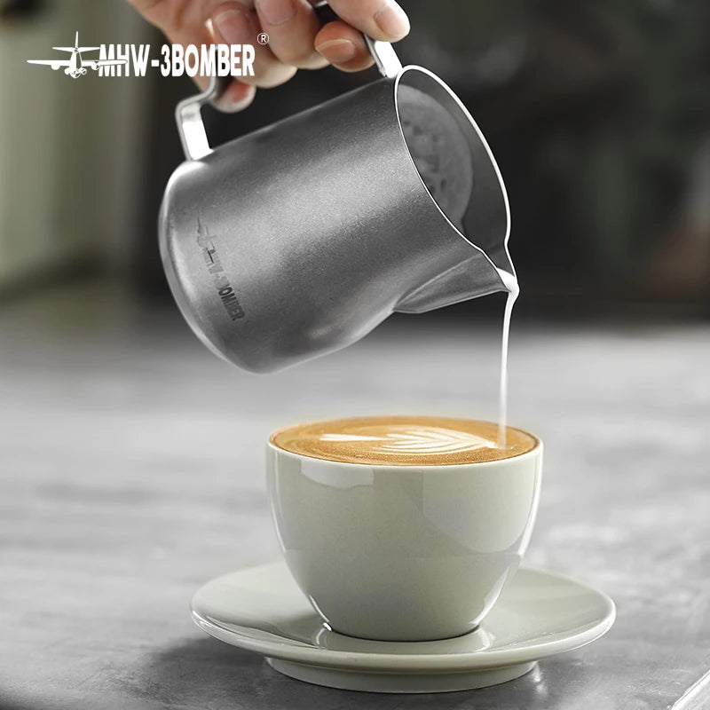 MHW-3BOMBER barista milk pitcher ergonomic handle detail stainless steel construction