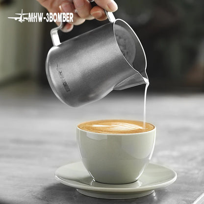 MHW-3BOMBER barista milk pitcher ergonomic handle detail stainless steel construction