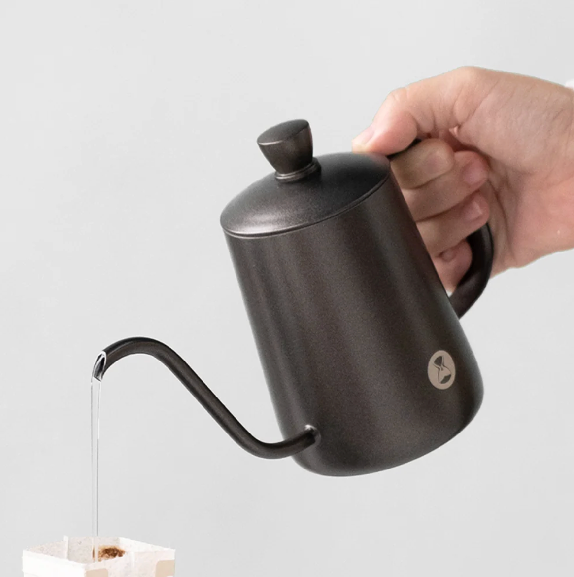 Close-up of Timemore Fish kettle matte black finish and ergonomic anti-scald handle