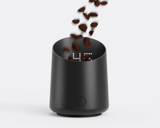 Subminimal Subscale single dose coffee scale sitting inside grinder hopper on white background